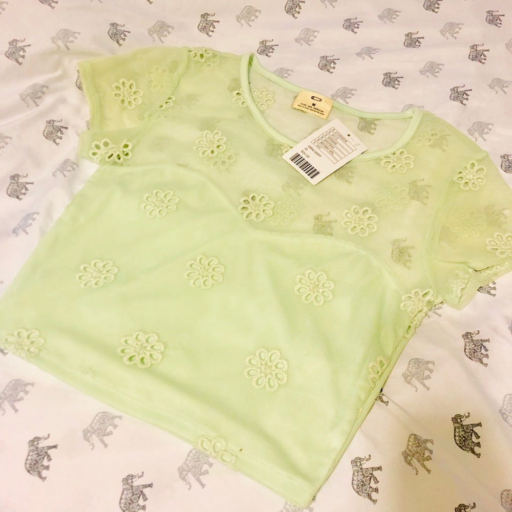 Urban Outfitters’ lace green crop top